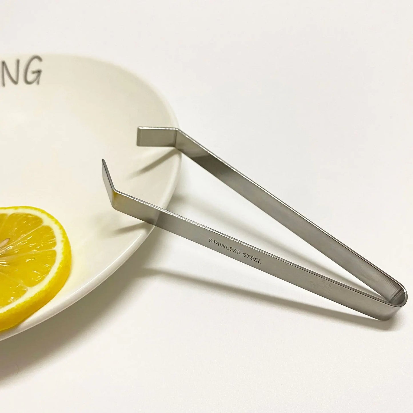 Stainless Steel Hair Clipper and Garlic Peeler Tool